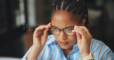 Buy stock photo Reading, glasses or black woman in office with tech, draft edit or source feedback for article. Review, reflection or journalist in agency with specs, fact check or industry research for publication.