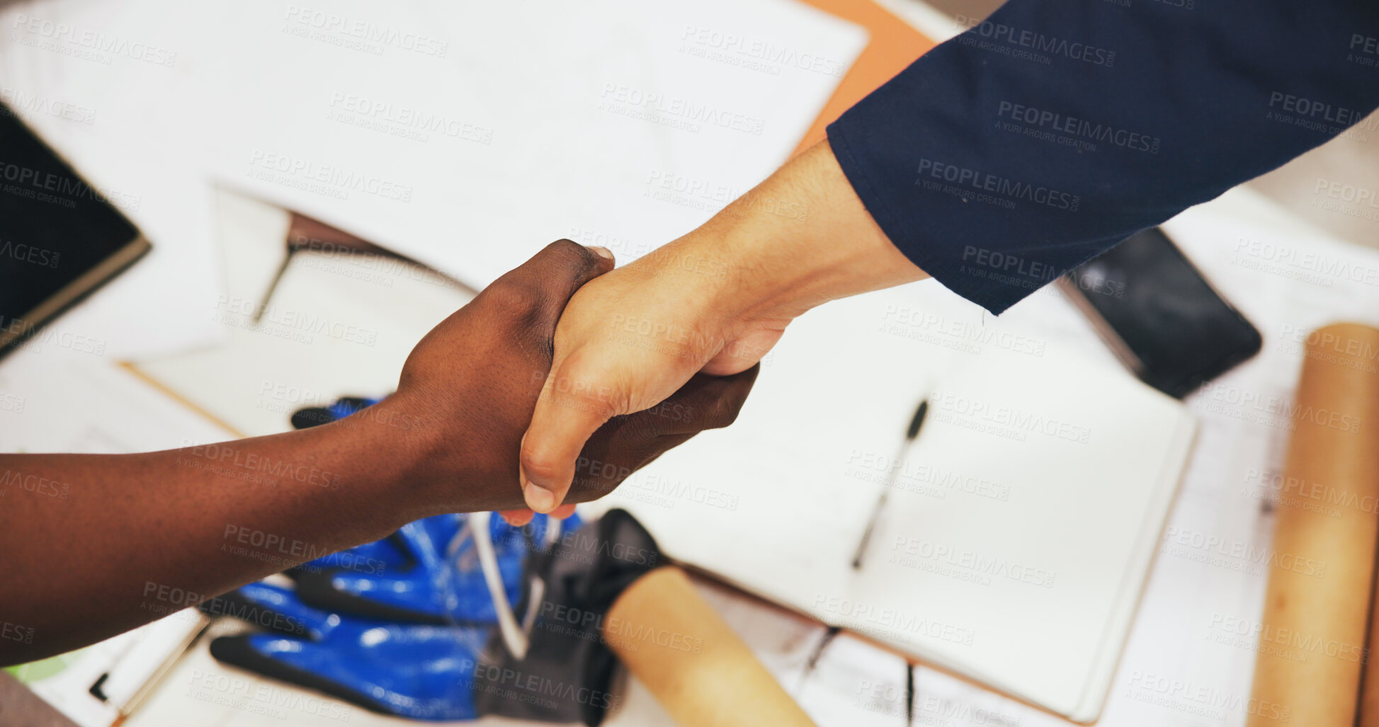 Buy stock photo Above, handshake and people with agreement, documents and thank you with distribution deal. Closeup, shaking hands or employees in workplace, b2b proposal or contract for partnership or collaboration