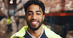Portrait, man and smile for logistics in warehouse with career pride, quality control and freight. Male person, happiness and about us for storage inspection, supply chain and safety for distribution