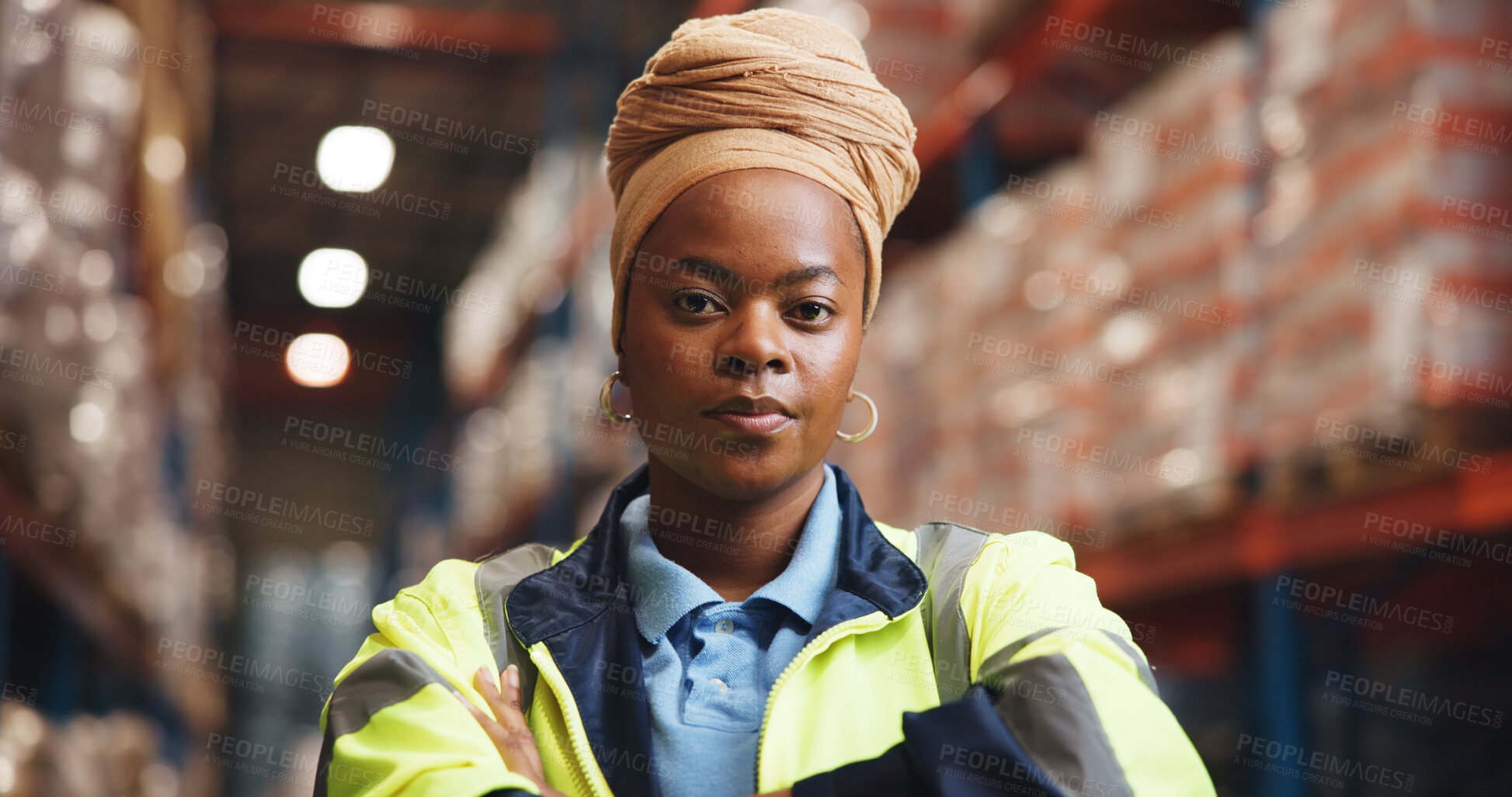 Buy stock photo Portrait, African woman and arms crossed in warehouse for logistics, quality control and freight. Female person, confident and about us for storage inspection, supply chain and distribution industry