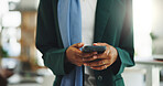 Woman, hands and typing in office with phone for business communication, social media or online chat. Female person, scroll or browse in workplace with tech for company email, text message or website
