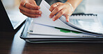 Documents, finance and hands of business person at desk in office for review of charts or graphs. Paperwork, reading and report with accountant woman in financial workplace for wealth management