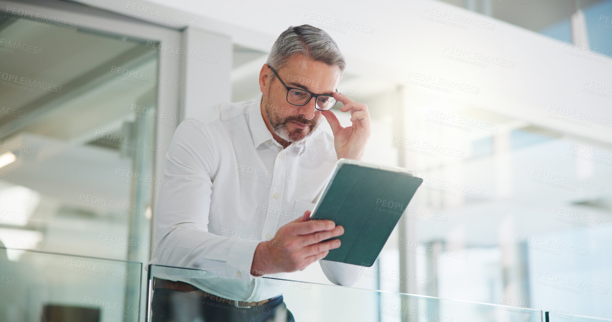 Buy stock photo Tablet, reading and research with business man in office for key account manager, roi project and planning. Funding review, budget admin and digital report with mature person in agency as advisor