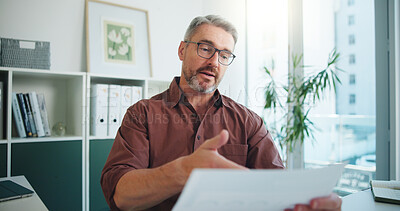 Buy stock photo Portrait, video call and man in workplace, documents and talking with financial agency. POV, investor or mature person with paperwork, advice or report for investment audit or feedback for trading