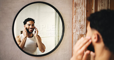 Buy stock photo Happy man, grooming and hygiene with mirror in bathroom for morning routine or cosmetics in home. Male person, reflection or cleaning with smile, facial treatment or skincare for smooth skin in house