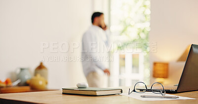 Buy stock photo Man, talking and phone call with laptop at house for consultation, contact source and feedback. Journalist, remote work and glasses with notebook, editing manuscript and fact check for publication