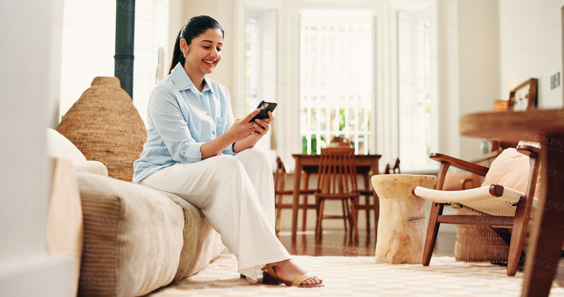 Buy stock photo Couch, reading and happy woman typing with phone on weekend, social network or check message app for alert. Notification, digital communication or person texting in home, email reply or online chat