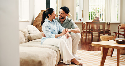 Buy stock photo Happy, sofa and couple in home in conversation for connection, bonding and relax in apartment. Laugh, marriage and man with woman in living room with joke for talking, healthy relationship and love