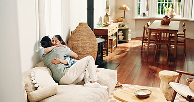 Buy stock photo Relax, hug and love with couple on sofa of home for connection, romance and bonding. Support, happy and trust with man and woman embrace in living room of apartment for commitment, marriage and care