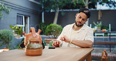 Buy stock photo Watch, late and man waiting for date on valentines day, anniversary or romantic celebration. Worry, reservation and male person with time management for dinner at outdoor restaurant or diner.