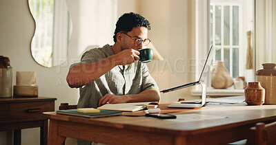 Buy stock photo Man, coffee and reading with laptop at house for research, copywriting and editor feedback. Person, remote work and beverage for proofreading on pc, update draft and story submission for publication