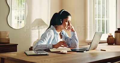 Buy stock photo Remote work, woman and laptop with headphones in home for audio transcription, editing or listening. Freelancer, transcriber and tech at desk for playback software, video recording and proofreading