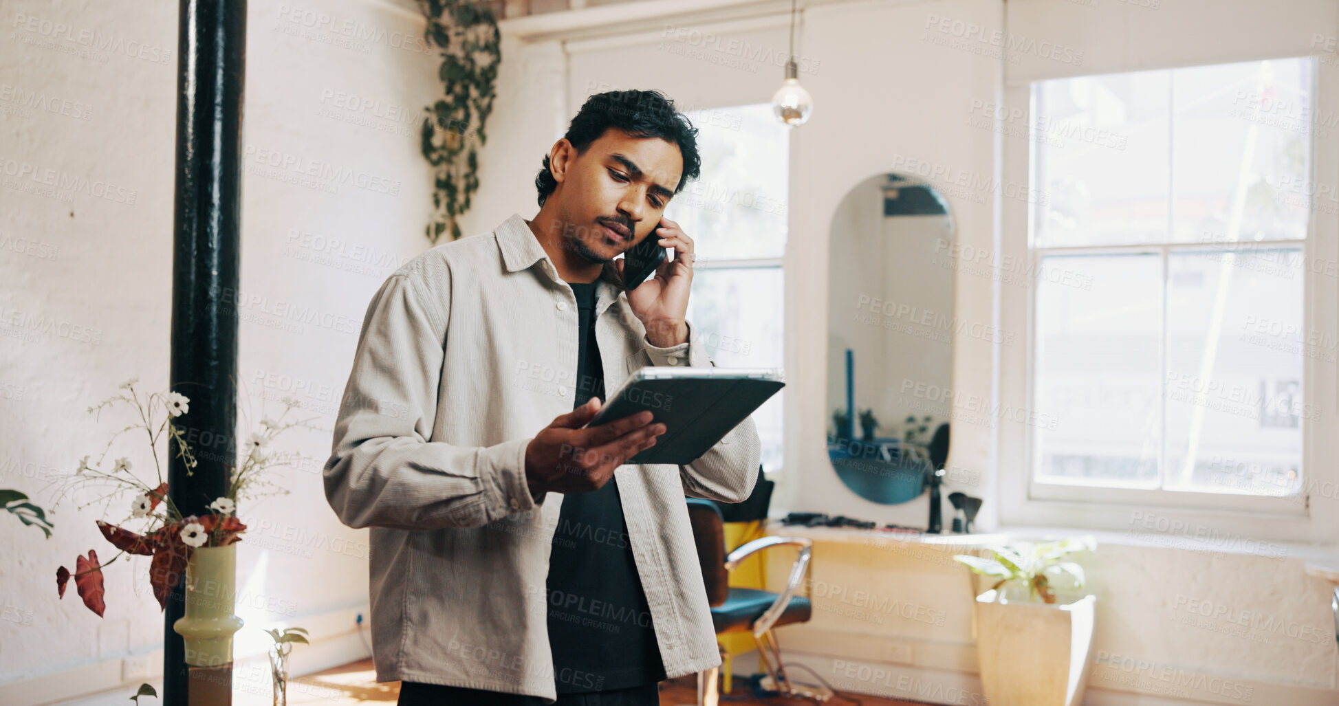 Buy stock photo Tablet, phone call and barber with business in salon for communication for appointment schedule. Digital technology, cellphone and male hairdresser on mobile discussion for contact with client.