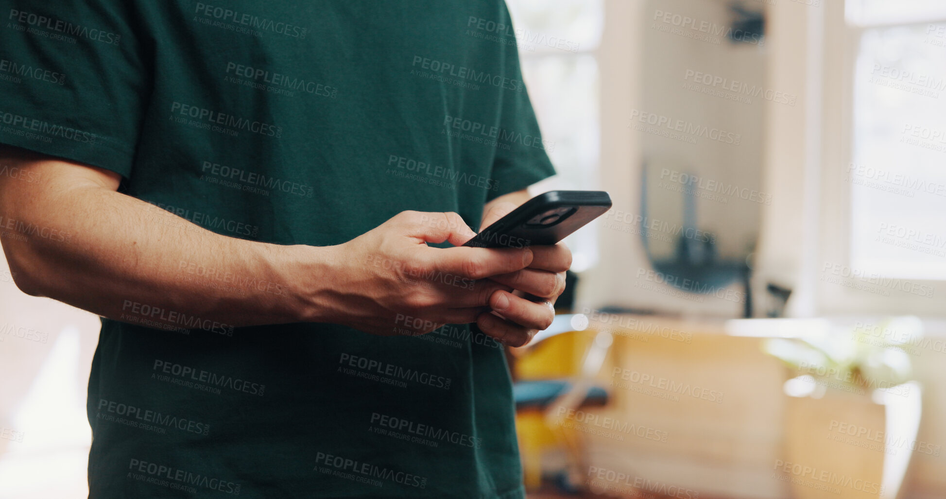 Buy stock photo Phone, typing and man barber in salon with communication for appointment schedule with client. Cellphone, texting and hairdresser with contact, email or connectivity on mobile app at beauty parlor.