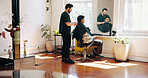 Appointment, grooming and barber with client in salon for haircut, maintenance or discussion. Consultation, conversation and male hairdresser with customer for trim, hairstyle or self care in parlor.