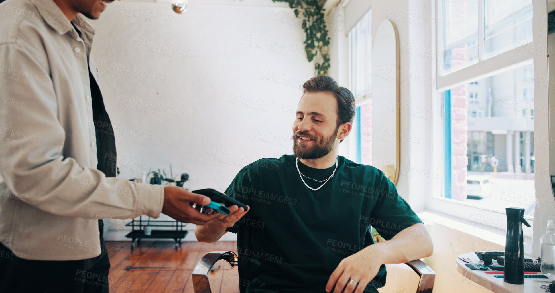 Buy stock photo Happy man, hairdresser or customer with phone for payment, banking app or pos machine in salon. Male people, barber or client with mobile smartphone for tap to pay or wireless transaction in parlor