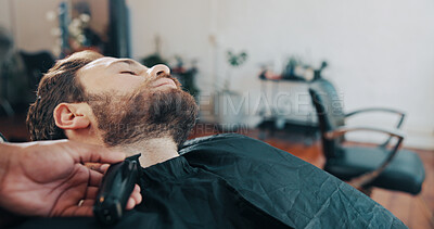 Buy stock photo Beard, barber and man with customer in chair for grooming, haircut and trim for hairdresser service. Hair salon, appointment and people with tools for styling, wellness and treatment in barbershop