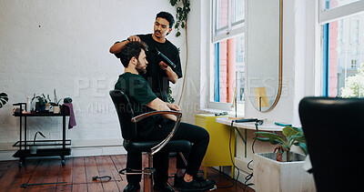 Buy stock photo Consultation, blowdryer and barber with client in salon for haircut, maintenance or discussion. Appointment, people and male hairdresser with customer for drying hairstyle or self care in parlor.