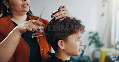 Buy stock photo Hair, hands and styling with boy in barbershop for appointment, consulting or treatment. Cutting, scissors or service with stylist woman and teen customer in small business salon for maintenance