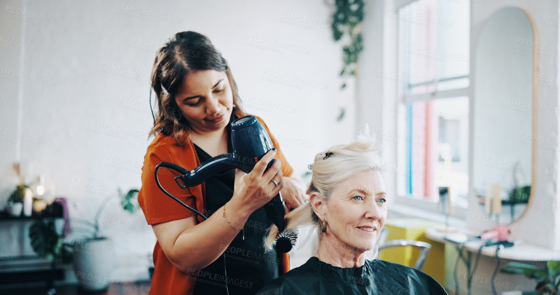 Buy stock photo Blow dry, curling and style with people at hairdresser for appointment, consulting or treatment. Brush, hairdryer or service with mature client and stylist in salon for maintenance or restoration