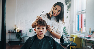 Buy stock photo Cutting, hairdresser and child with cape, small business and hair maintenance with equipment. Woman, appointment and person with boy for haircut, grooming and process with teenager and talking