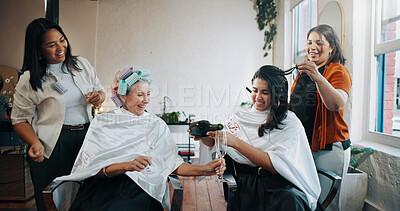 Buy stock photo Hair salon, senior mother and woman with champagne, celebration and wedding preparation for beauty. Hairdresser, wine and people with adult daughter with mom, drink or smile with bride for haircare