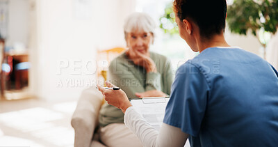 Buy stock photo Clipboard, healthcare and question with nurse speaking to senior patient in home living room. Medical, notes or report with caregiver and old woman in apartment for consulting, feedback or review