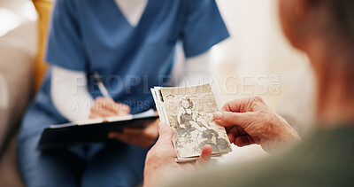 Buy stock photo House, memory and old woman in lounge, picture and nostalgia with love, wonder and thinking. Apartment, nurse or senior person with photography, retirement and mourning death with history or remember