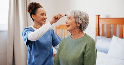 Buy stock photo Senior woman, nurse and brush for hair care in bedroom, happy and helping hand with grooming routine. Elderly person, caregiver and comb with smile, conversation or assisted living in retirement home