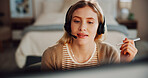 Woman, remote work and headset with computer in home for customer service, crm and assistance. Female person, pc or reading script for technical support, helping client and representative for inquiry