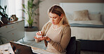 Pills, medication and woman in bedroom with remote work for health supplements in home. Medicine, wellness and female freelancer with tablets for headache relief with prescription drugs in house.