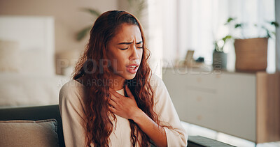 Buy stock photo Sick, woman and chest pain with pressure on sofa from heart attack, angina and medical crisis. Discomfort, person and breathing problem in home with cardiac arrest, hypertension and health emergency