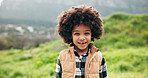 Portrait, child and boy with smile by field, winter vacation and weekend nature outing for wellness. Happiness, outdoor hike or kid with positive attitude for holiday trip, relax and peace for break