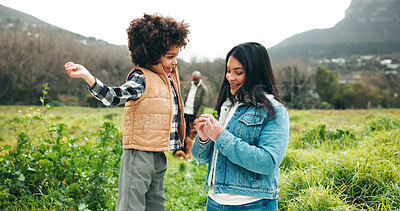 Buy stock photo Happy, mom and child with plant, countryside and bonding on holiday, outdoor and together in nature. Family, adventure and people with boy on vacation, eco friendly and woman with smile for trip