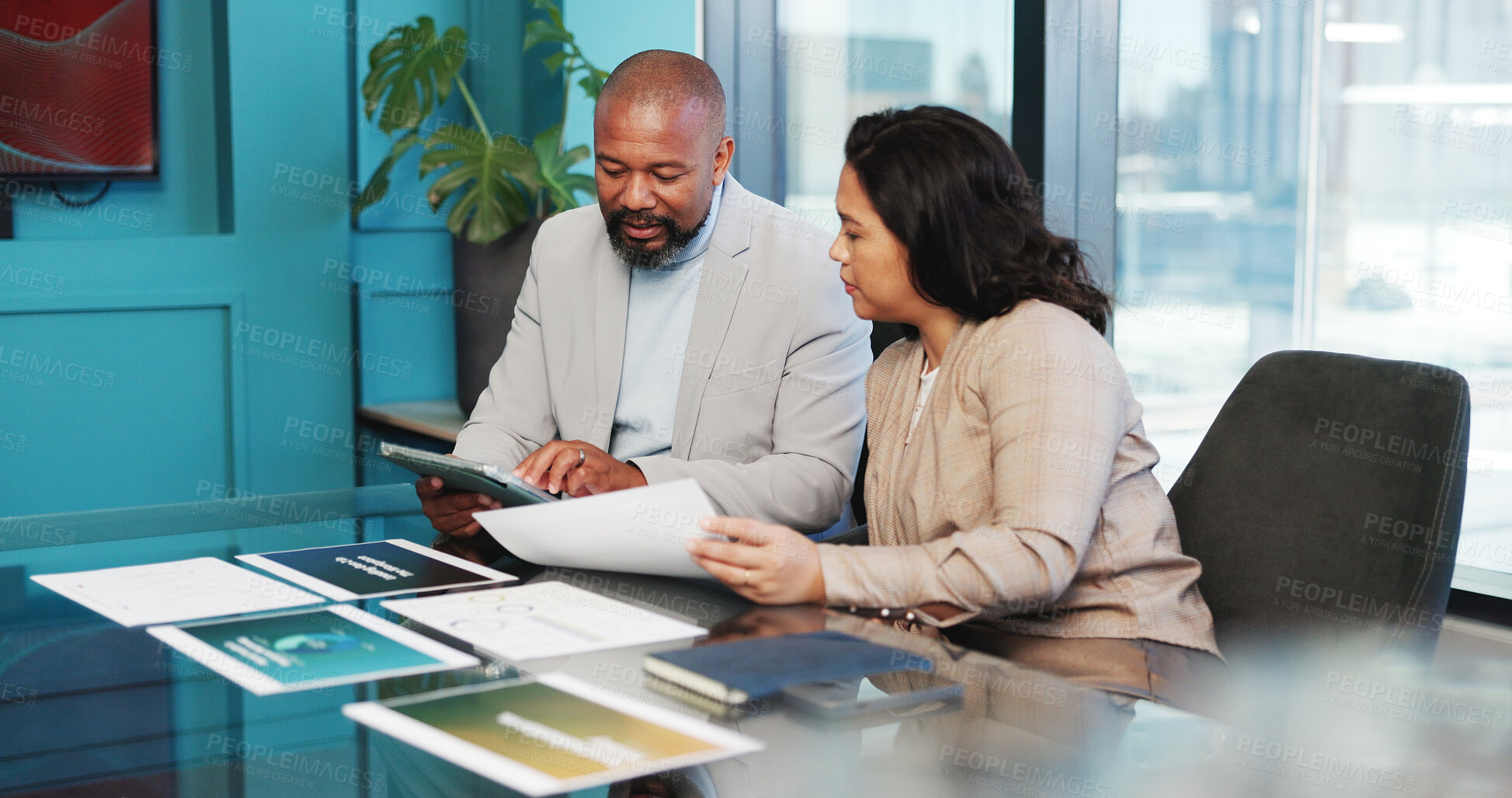 Buy stock photo Graphs, paper or partners in office with tablet, analysis or review of financial performance. Collaboration, discussion or analyst in agency with tech, market comparison or feedback on revenue growth