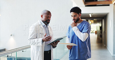 Buy stock photo Doctor, tablet or nurse with folder discussion in clinic for treatment solution, opinion or advice. Health team, men or medical records in hospital hallway for explaining results or report comparison