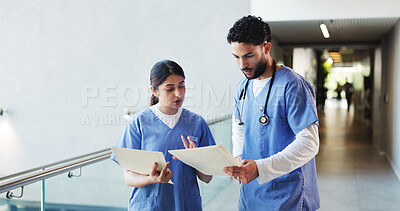 Buy stock photo Nurse, conversation and people in hospital, documents and healthcare with feedback. Medical service, man and woman in clinic, paperwork and report for diagnosis, collaboration or advice with research