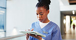 Typing, doctor and black woman on tablet in hospital for patient results, medical report and research. Healthcare, clinic and person on digital tech for insurance, surgery schedule and planning