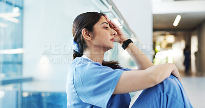 Buy stock photo Nurse, woman and thinking with stress in clinic for bad news, medical mistake or treatment fail. Health professional, employee and anxiety on hospital floor for surgery crisis, burnout risk and worry