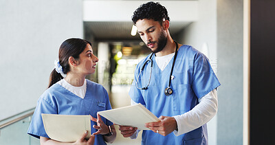 Buy stock photo Nurse, talking and people in clinic documents and healthcare with feedback. Medical service, man and woman in hospital, paperwork and report with support, discussion and advice with research and help