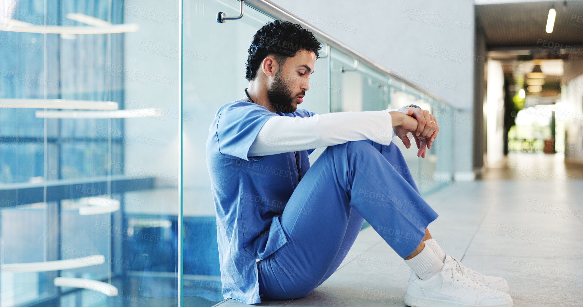 Buy stock photo Medical, sitting or doctor in hospital with pressure, patient loss or stress in surgery result. Healthcare, bad news or man in clinic with disappointment, reflection and burnout in emergency risk.