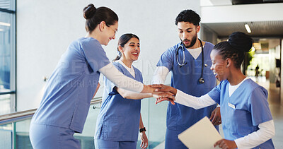 Buy stock photo Smile, people and doctors with handstack in hospital for celebration, surgery success and victory. Happy, healthcare workers and huddle for medical milestone, staff motivation and team achievement