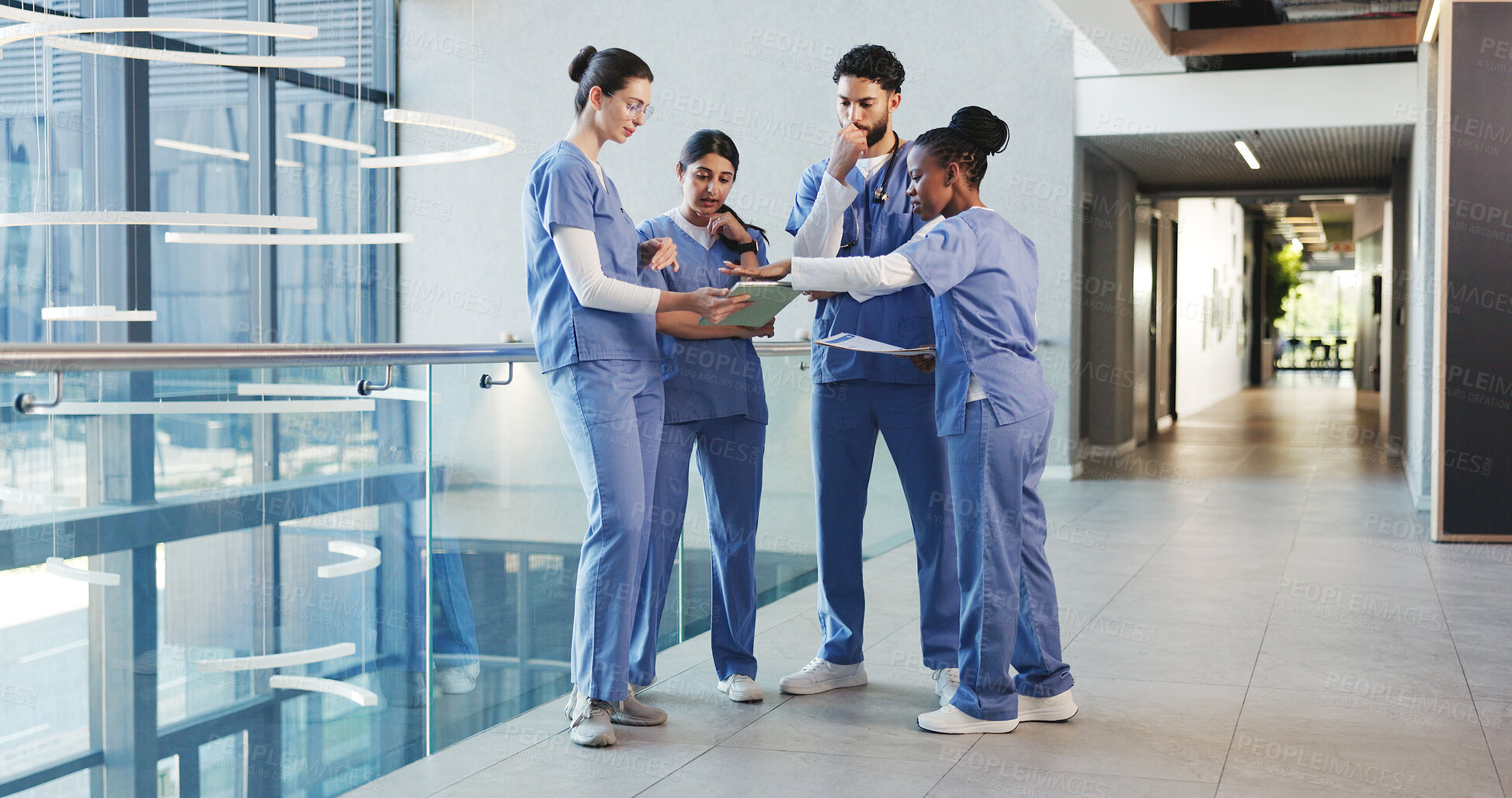 Buy stock photo Meeting, hospital and med students on tablet in lobby for consulting, medical advice and diagnosis. Healthcare, doctor internship and people on digital tech for patient results, research and planning