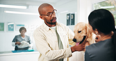 Buy stock photo Veterinary, dog or man in center for guidance, pet care or inspection in medical visit. Health, advice and animal doctor in clinic with puppy, golden retriever or support in physical consultation.