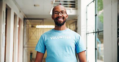 Buy stock photo Portrait, volunteering and black man with community service, pride and support for recycling. NGO, smile and person with tshirt, earth day and humanitarian project with confidence and environment