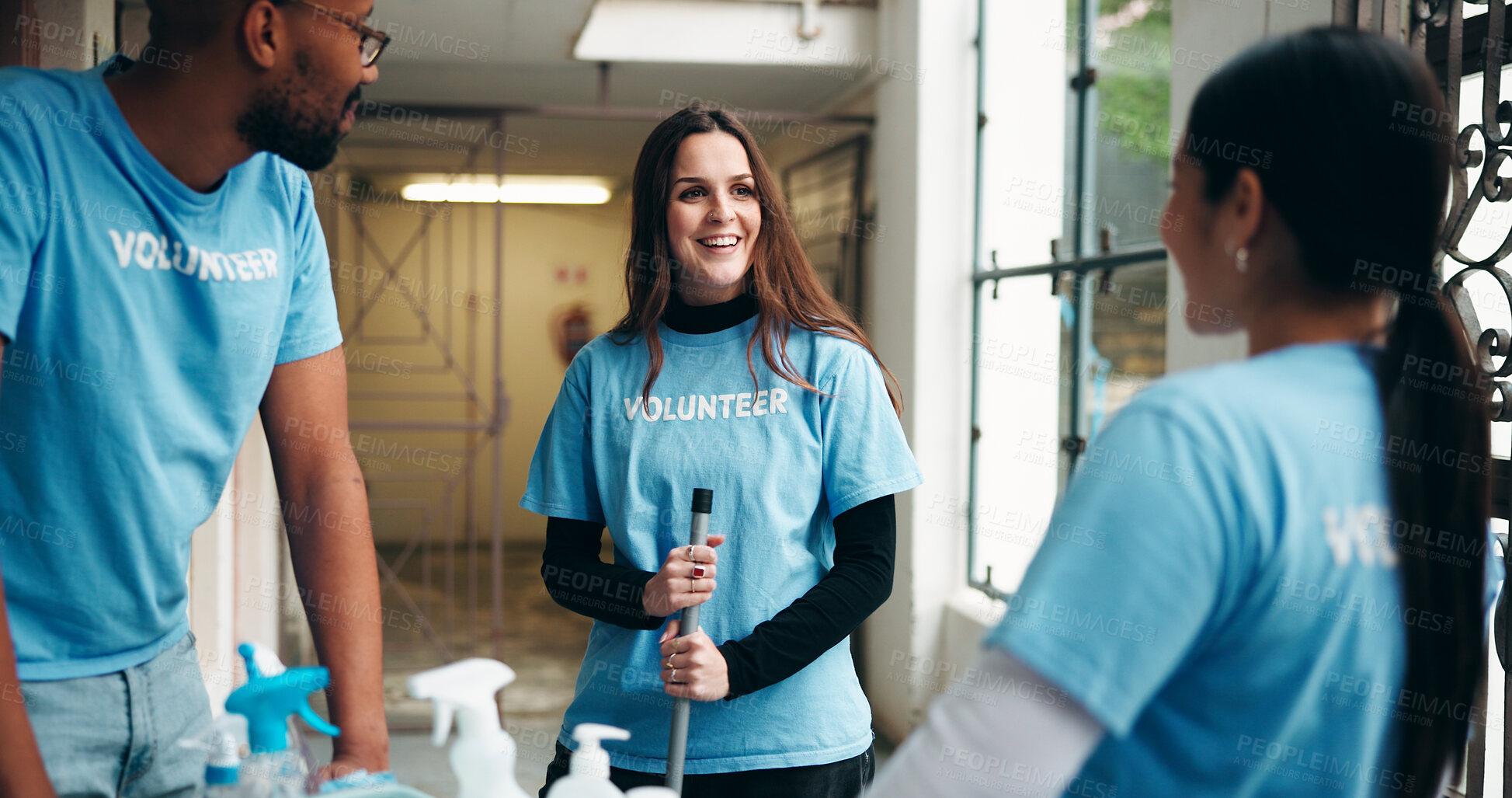 Buy stock photo People, volunteer and smile for cleaning, corridor maintenance and workplace hygiene. Happy, team and hallway cleanliness with supplies, ngo outreach and sanitation project for social responsibility