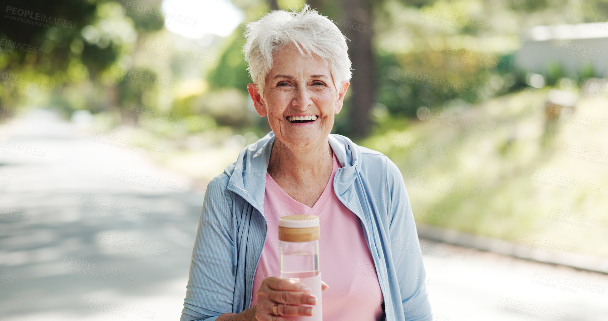 Buy stock photo Park, fitness and portrait of senior woman with water bottle for wellness, health and hydration. Outdoor, morning and elderly person with smile for active hobby, exercise and walking for mobility