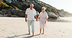 Walking, old couple and holding hands on date, beach and bonding on anniversary, loyalty or vacation. Outdoor, senior people and romance on summer holiday, relationship and commitment for marriage