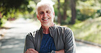 Park, happy and portrait of senior man with crossed arms for wellness, health and confidence. Outdoor, morning and elderly person with smile for active workout, exercise and walking for mobility