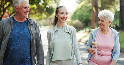 Buy stock photo Exercise, woman and walking with senior parents, park and laughing at funny story, happy and fitness. Outdoor, old people and workout routine with daughter, wellness and bonding with family or joke